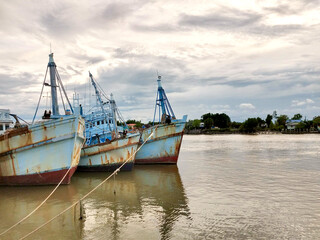 Fototapeta premium Commercial fishing boats in the port
