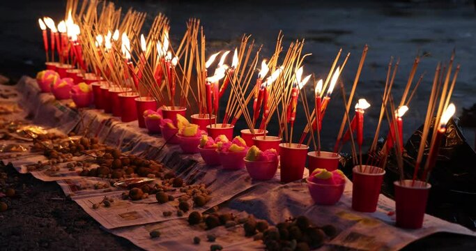 Burning for joss paper sticks fire flame amber to ashes for Chinese hungry ghost festival