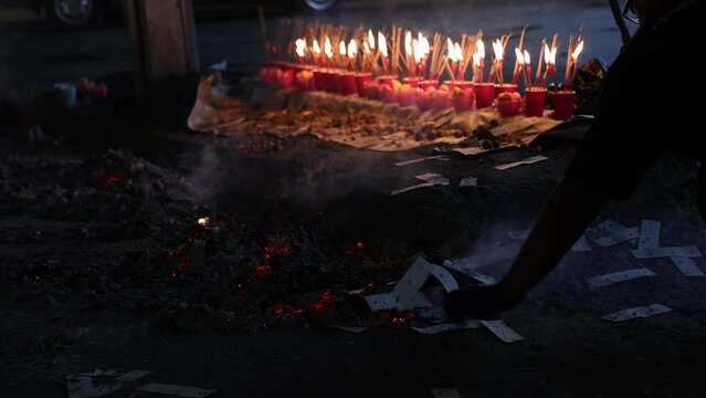 Burning for joss paper sticks fire flame amber to ashes for Chinese hungry ghost festival