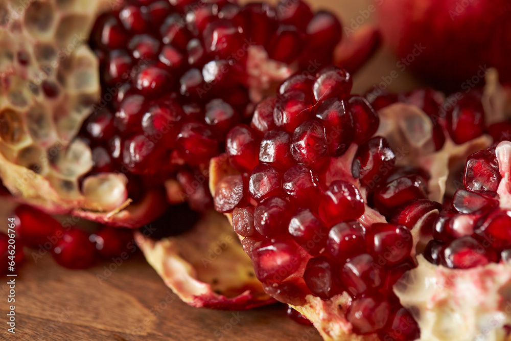 Sticker pomegranate seeds on cutting board