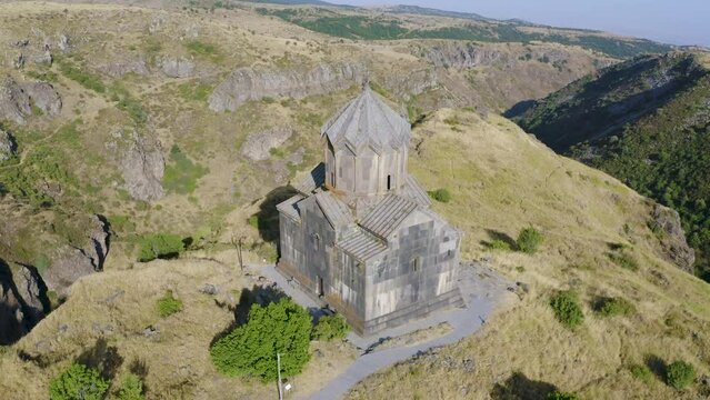 Slide drone footage of Vahramashen Church on sunny summer day. Amberd fortress, Aragatsotn Province, Armenia.