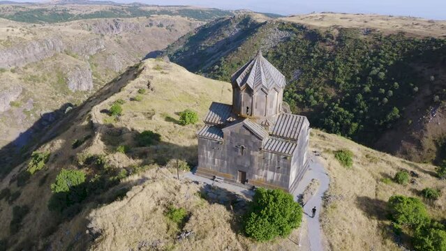 Orbital aerial shot of Vahramashen Church on sunny summer day. Amberd fortress, Aragatsotn Province, Armenia.
