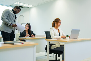 Leader or businessman sends documents male colleague in the creative office.