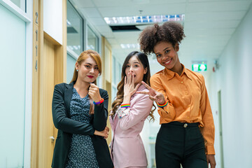 Professionals having a discussion, Successful business team working together in a co-working office.	