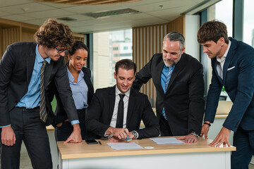 Multiracial business people having meeting and brainstorming discussed about work in conference room in the creative office.