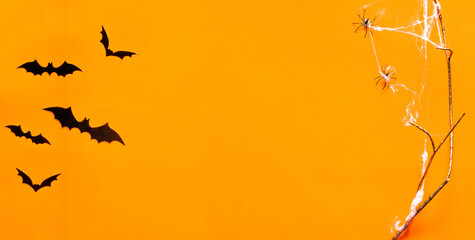 Halloween bats on orange background. Horror concept. Background. Greeting card.