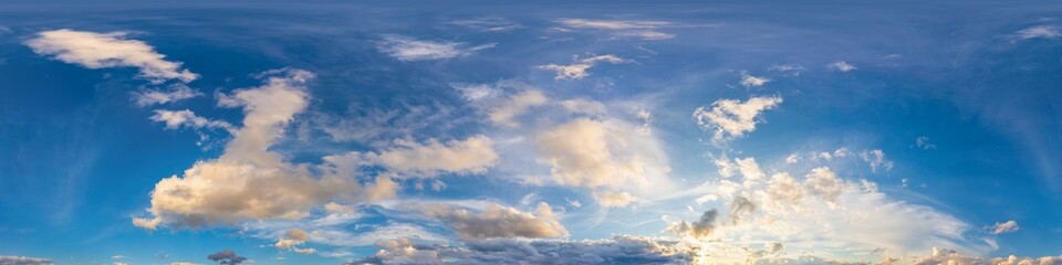Sunset sky panorama with bright glowing pink Cumulus clouds. HDR 360 seamless spherical panorama....