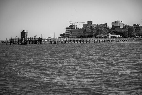 Between sea and lagoon. Sailing trip between the Marano lagoon and the Gulf of Trieste. Black and white.