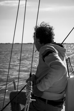 Between sea and lagoon. Sailing trip between the Marano lagoon and the Gulf of Trieste. Black and white.