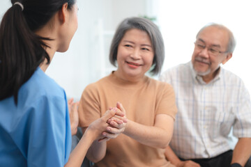 Obraz premium Senior Asian female and elderly male person with mental health disease care lifestyle, mature, care, old, adult retirement woman and man patient are happy at home, elder grandmother having smile
