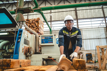 African American man carpenter working in wood business workshop. black people technician craftman,...