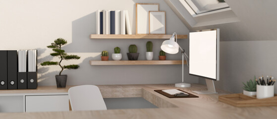 A minimalist white home office workspace with a computer on a wooden corner table.