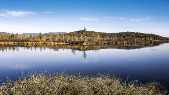 Stretching over emerald lake scenery