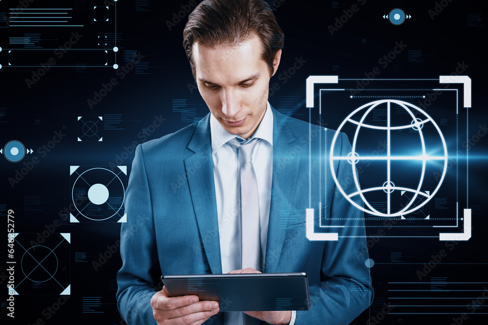 Aufkleber Portrait of attractive young european businessman with tablet and creative hacking interface on dark background. Code window high tech UI and spyware concept.