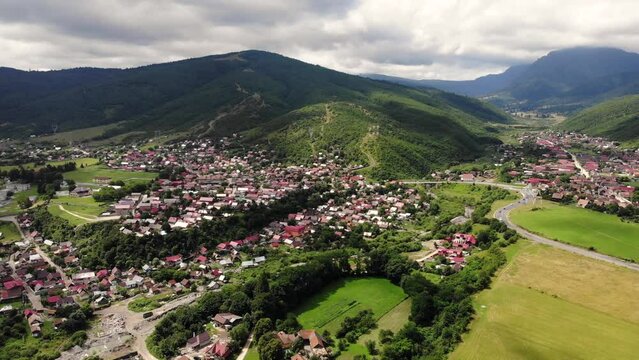 Panoramic aerial view of Garcini, Sacele, Brasov on a partly cloudy day