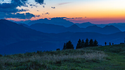 Mountain silhouettes in the panorama of the Bregenzerwald, with Säntis in the background. Sunset...