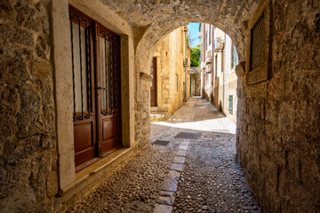 Fototapeta na wymiar street view of the old town Dubrovnik, Croatia, medieval European architecture, narrow streets in historic city, the concept of traveling through the Balkans