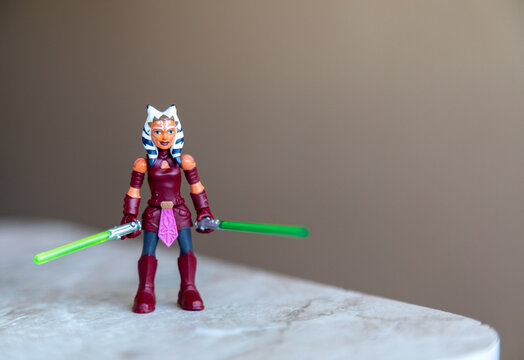 Bishkek, Kyrgyzstan - September 10, 2023: Ahsoka with light sabers toy. Former Jedi Knight Ahsoka Tano once served as the Padawan learner to the Jedi Anakin Skywalker during the Clone Wars