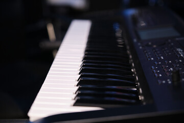 Close up of a keyboard synthesizer piano. Copy space.