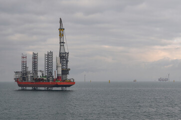 Process of wind turbines installation in the sea by jack up vessel.