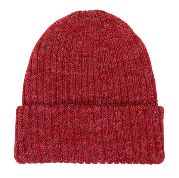 Red knitted winter bobble hat of traditional design isolated on white background