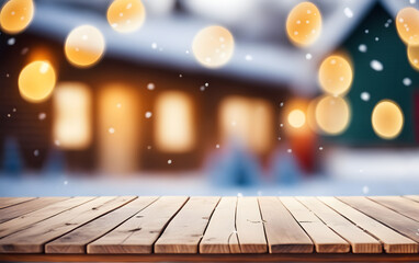 Empty wooden table, blurred Christmas decorated house exterior