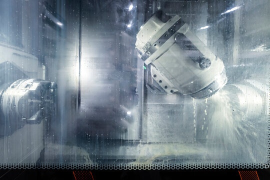 Machinery seen from wet glass