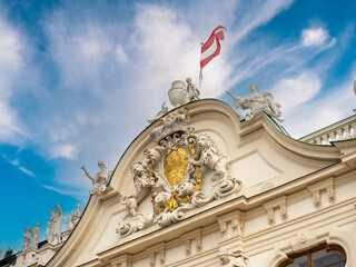 Fototapeta na wymiar August 5, 2023, Austria, Vienna. Top of the façade of the Austrian Parliament building.