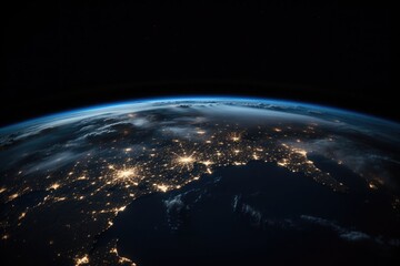 Aerial view of illuminated cityscape against sky at night