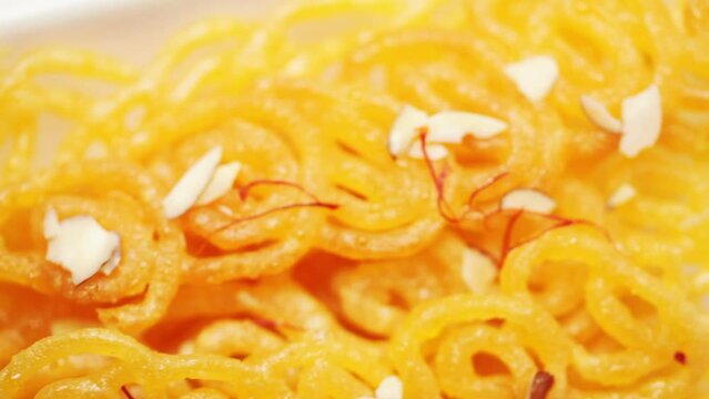 Close-up of the Iconic Indian Dessert "Jalebi". Made up of curd maida, and sugar.