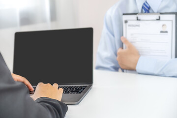 Office executives hand use laptop and interviewing job applicants in the meeting room. employer conversation summary work employment