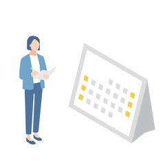 カレンダーを見ながらスケジュール管理をするビジネスウーマン