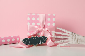 Halloween gifts in pink tones with cookies