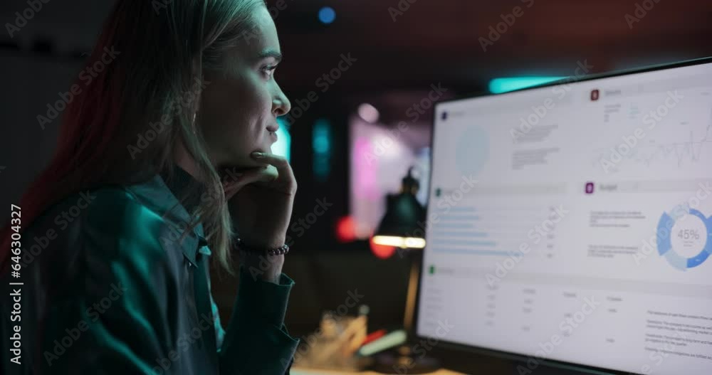 Fototapete Caucasian Female Smiling While Checking Data and Statistic Charts Using Desktop Computer. Portrait of a Happy Successful Businesswoman in Creative Agency in the Evening. Dolly Close Up