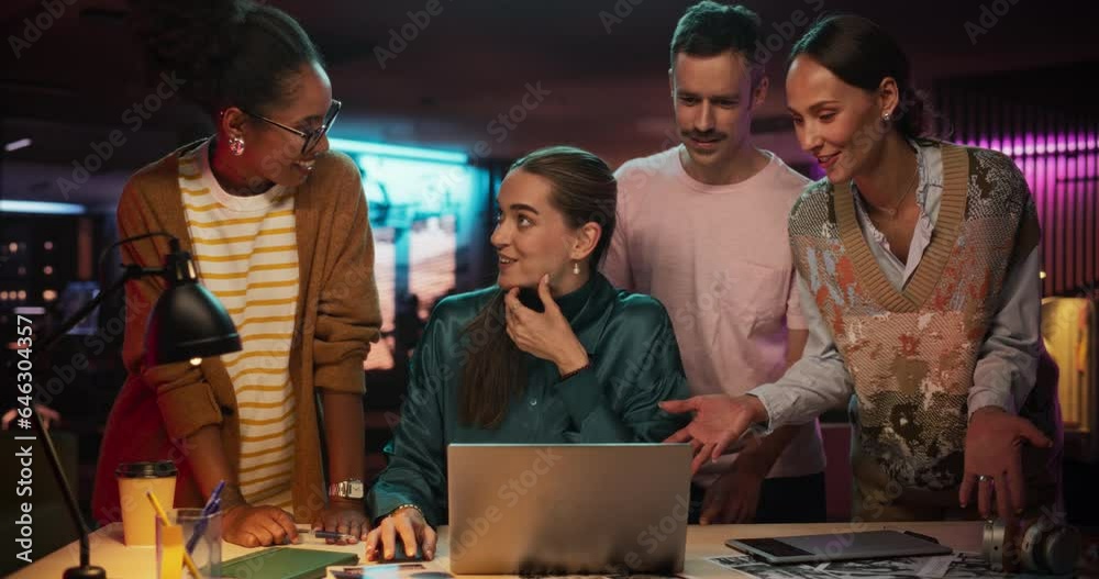 Poster Energetic Teammates Brainstorming For Marketing Strategy in a Creative Office at Night. Multiethnic Group of People Working on Developing Growth Ideas Based on Data Using Laptop Computer