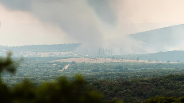 Timelapse Wildfire Smoke Large Brush Fire zoom Shot Greece
