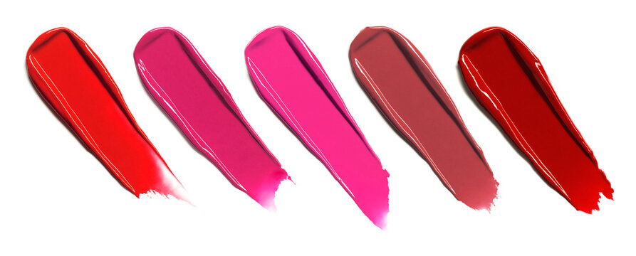 Lipstick range of shades texture composition isolated on white background. Cosmetic product smear smudge swatch sample
