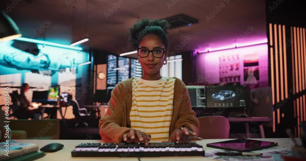 Poster African American Female Smiling While Checking Data Using Desktop Computer. Portrait of a Happy Successful Black Businesswoman in Creative Agency in the Evening. Zoom Out POV of Screen Monitor