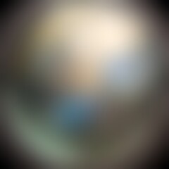 Defocused black glass glowing convex texture.