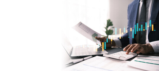 Businessman using calculator to calculate financial report and analyzing market data, business planning, market research, Business, Finance and Investment, data analysis concept.