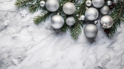 Silver and green Christmas ornaments, garland on white marble background, top view, Christmas background.