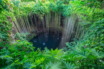 Mexico, Ik Kil Cenote near Merida Yucatan Peninsula in Archeological Park near Chichen Itza.