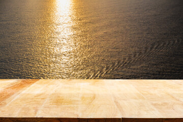 Wooden table. Summer background. with the sunset