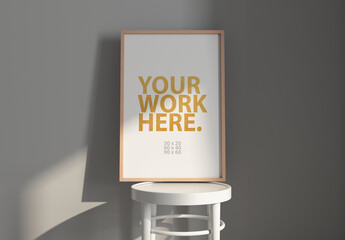 Vertical wooden poster Frame Mockup on white chair