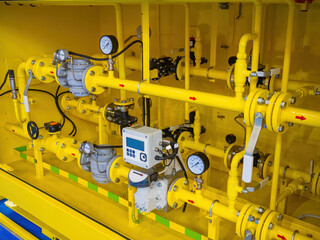 Gas equipment. Control and accounting equipment on pipes. Different yellow pipeline. Gas equipment...