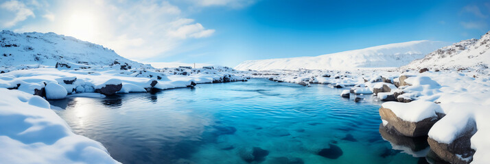 Crystal - clear blue river in Iceland, surrounded by snow and ice, midday, under clear skies
