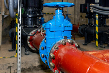 Industrial electric water pumps, pipes and valves - industry concept.