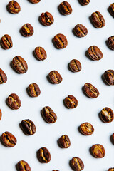 Obraz premium Coffee beans on white background - stock photo