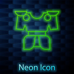 Glowing neon line Body armor icon isolated on brick wall background. Vector