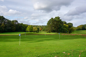 view over scenic golf course putting green. 18 hole parkland golf course. sport and leisure 
